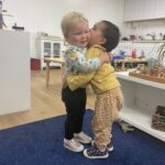 Two toddlers learning Emotional Intelligence at La Jolla Montessori School