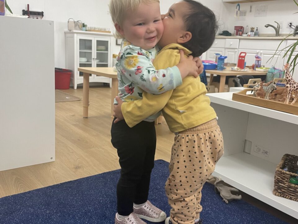 Two toddlers learning Emotional Intelligence at La Jolla Montessori School