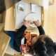 Girl learning to cut fruit in an Early Education Program at La Jolla Montessori School