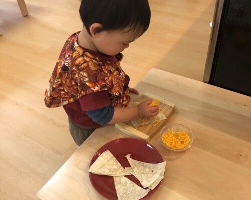 Toddler preparing lunch independently
