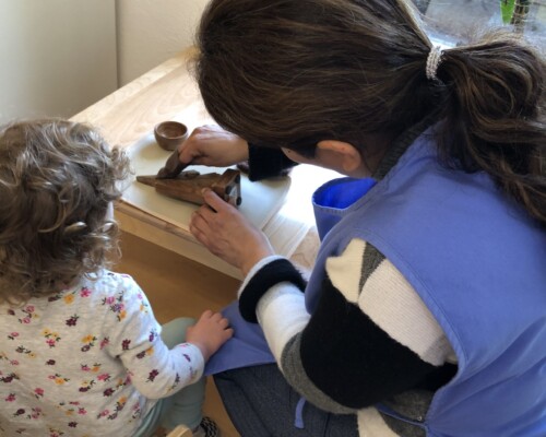 Toddler playing with puzzle