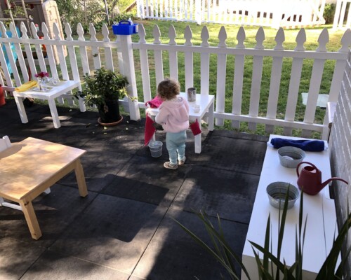 Toddler in a Montessori playground