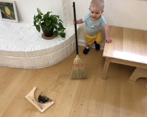Toddler Sweeping with a broom independently
