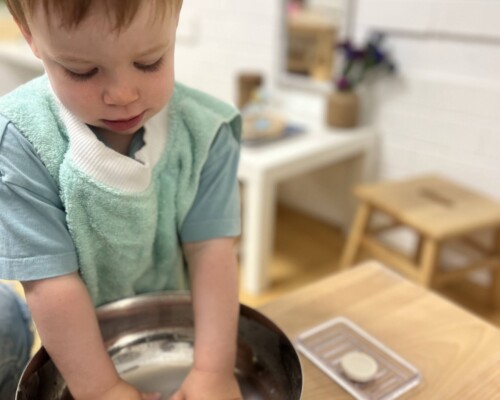 Toddler Care of Self Washing Hands at La Jolla Montessori