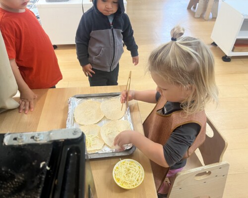 Toddler Care of the Environment Preparing Snack at La Jolla Montessori