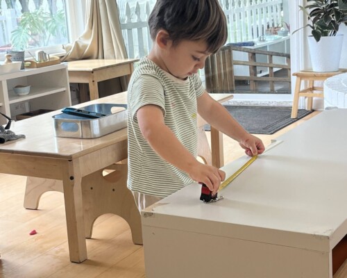 Toddler Measuring at La Jolla Montessori school