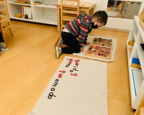 Toddler learning Spanish at Montessori school in La Jolla