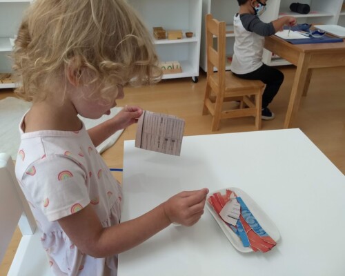 Toddler doing art independently