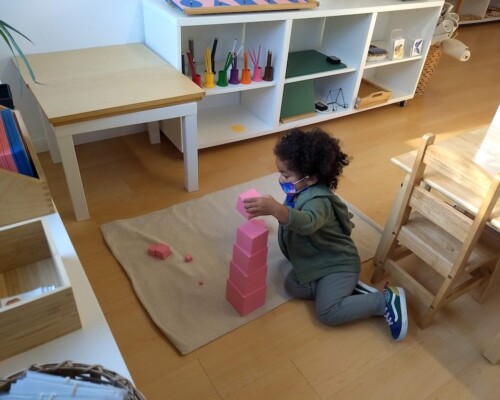 Toddler playing with shapes independently